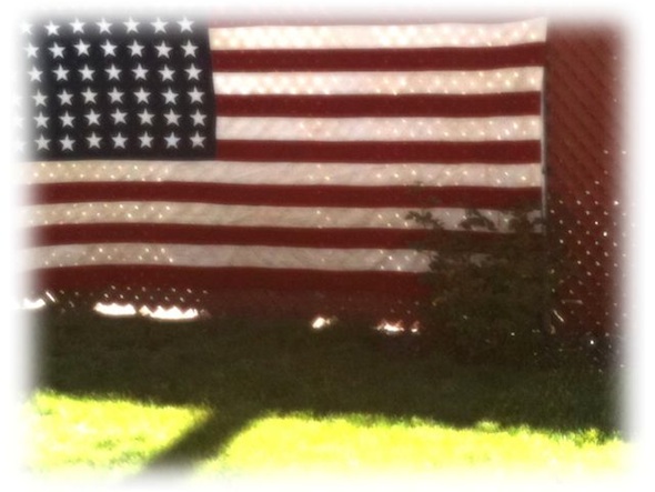 <cutline>Flag picture, taken at friend's Memorial Day picnic, was enhanced using the Photo fx app for iPhone.</cutline>  